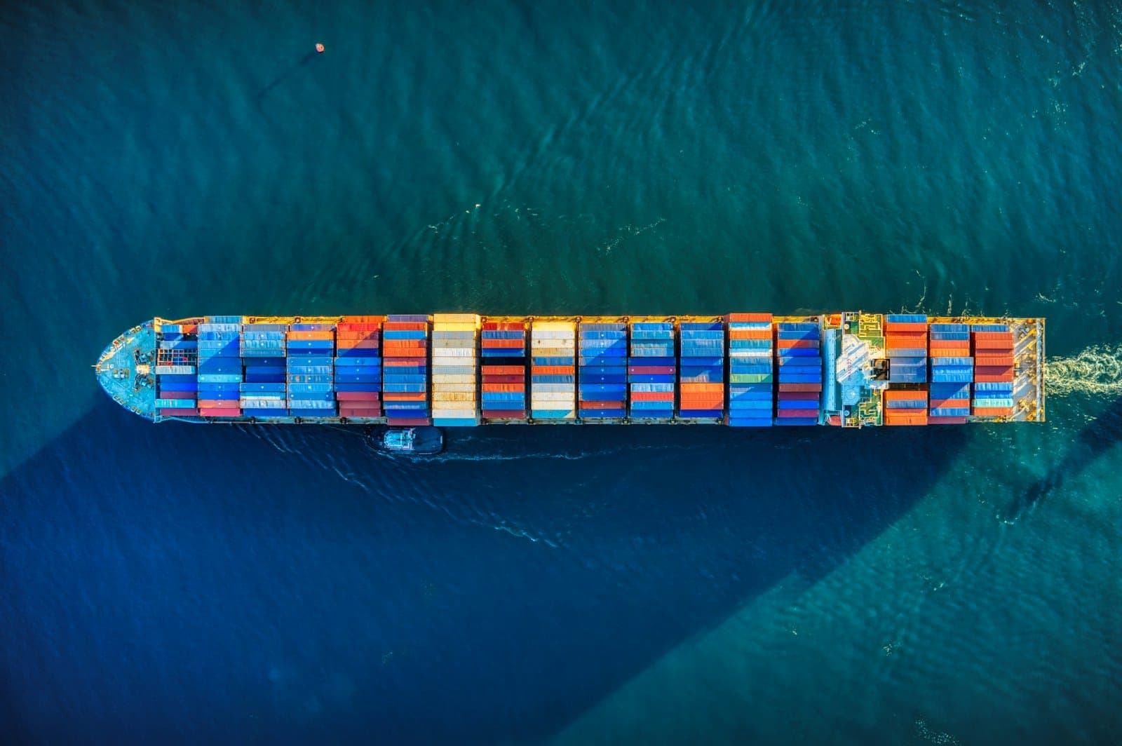 Aerial view of a container ship loaded with containers under way at sea